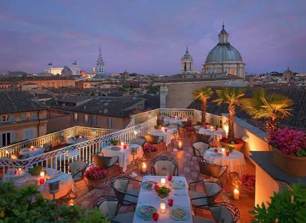 Rooftop aperitivo in Rome at golden hour
